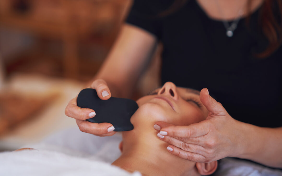 5 Benefits of Combining Gua Sha and Massage with Skin Treatments at the AcuBar